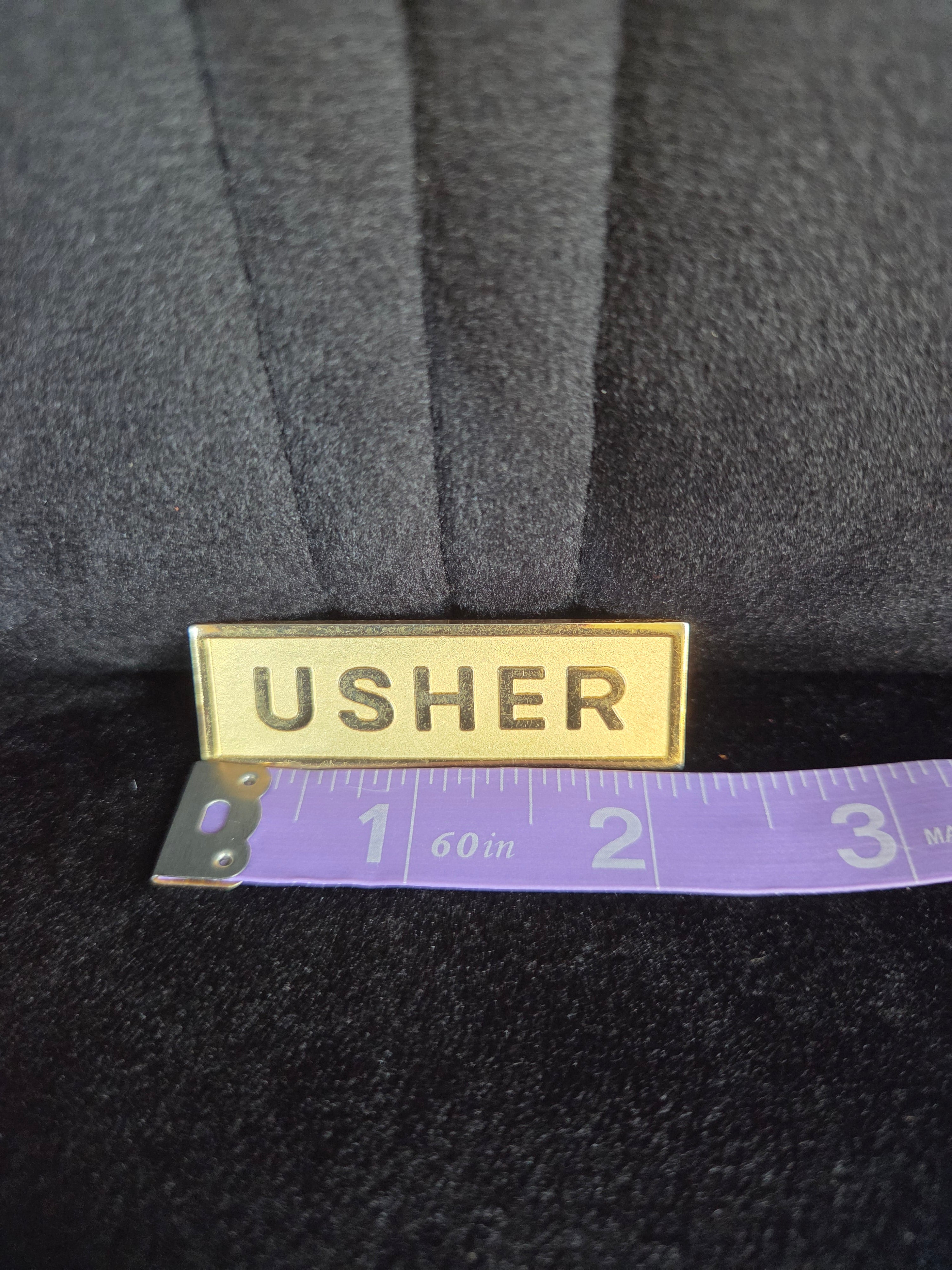 USHER Goldtone Brooch Pin